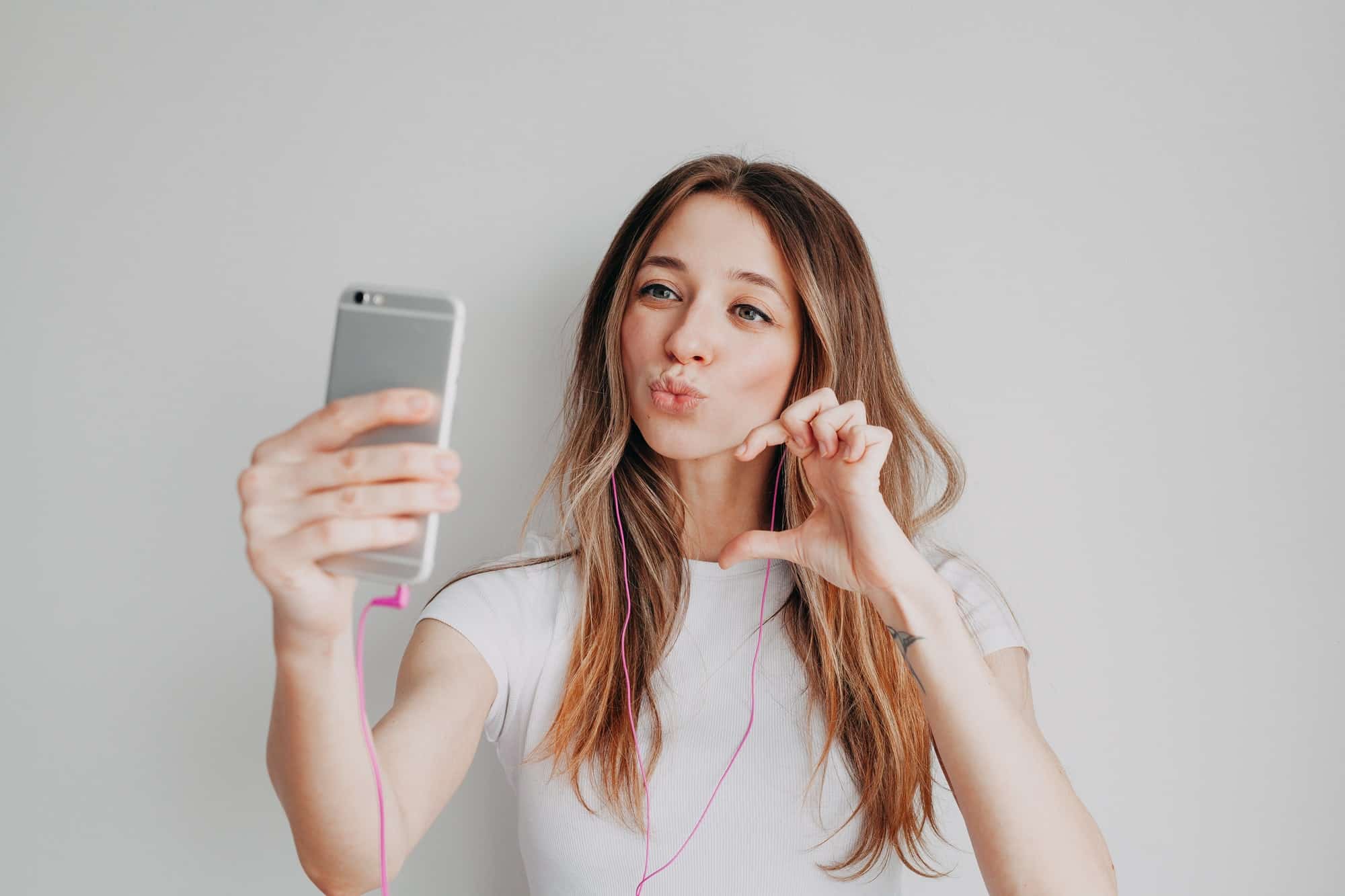 Young girl with mobile phone are making social media content, online calling, Instagram content